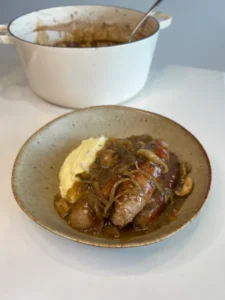 Cider braised sausages