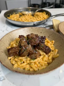 Garlic Butter Steak Bites with Creamy Parmesan Macaroni
